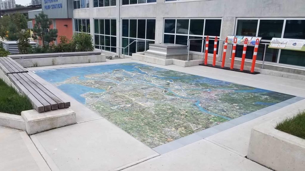 Bespoke tile flooring displaying a map at an observation platform in Vancouver